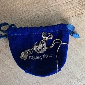 Waxing Poetic “c” initial necklace